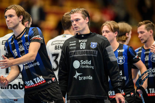 Helsingborgs Fredi Petersson och målvakt Jonathan Edling