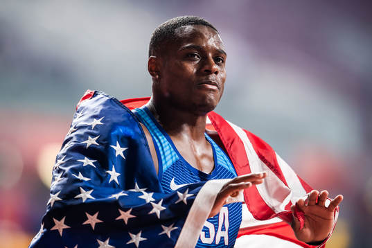 Christian Coleman of USA celebrates