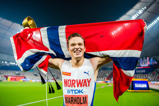 Karsten Warholm of Norway celebrates