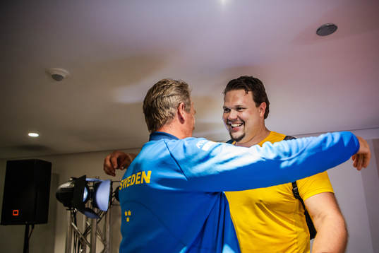 Daniel Ståhl of Sweden with his coach Vesteinn