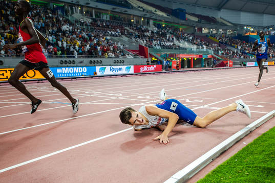 Jakob Ingebrigtsen of Norway takes a fall at the finish