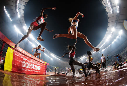 Courtney Frerichs of USA, Winfred Mutile Yavi of Burundi,