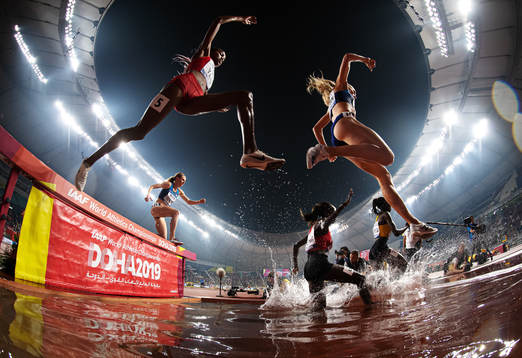 Courtney Frerichs of USA, Winfred Mutile Yavi of Burundi,
