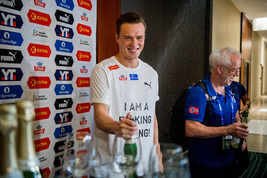 Karsten Warholm of Norway celebrates with his coach Leif