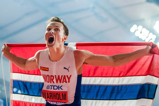 Karsten Warholm of Norway celebrates