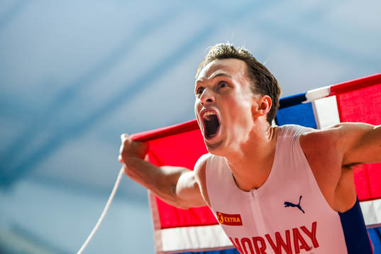 Karsten Warholm of Norway celebrates