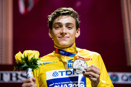 Armand Duplantis of Sweden poses with his silver medal at
