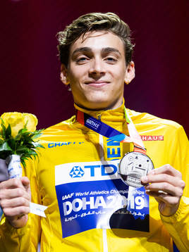 Armand Duplantis of Sweden poses with his silver medal at