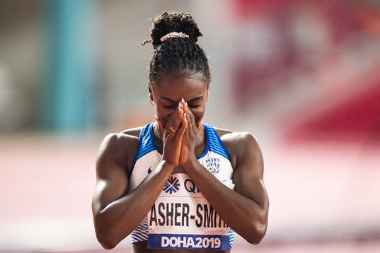 Dina Asher-Smith of Great britain celebrates winning