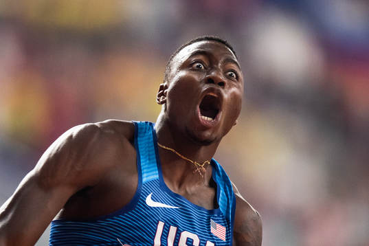 Grant Holloway of USA celebrates winning the men’s 110