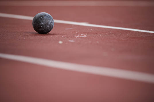 A shot put is lying