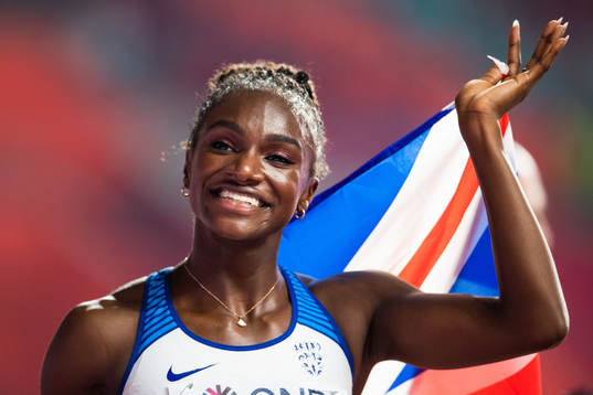 Dina Asher-Smith of Great britain celebrates winning