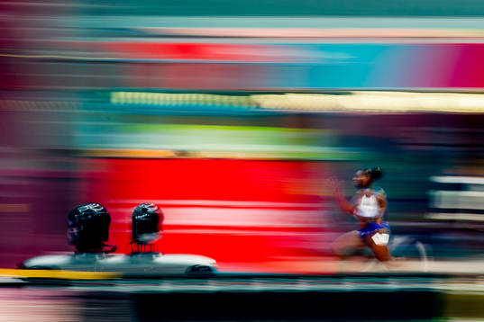 Dina Asher-Smith of Great Britain competes to win the