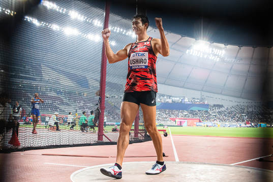 Keisuke Ushiro of Japan celebrates when competing in men's