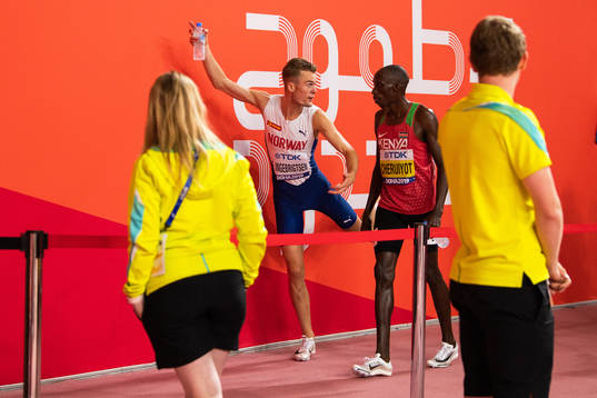 Filip Ingebrigtsen of Norway talking to  Timothy Cherouiyot