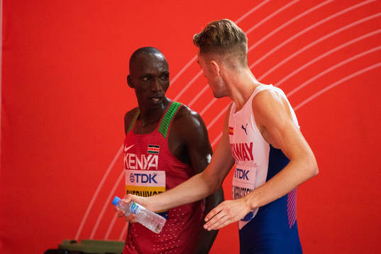 Filip Ingebrigtsen of Norway talking to  Timothy Cherouiyot