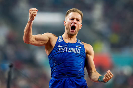 Janek Öiglane of Estonia celebrates when competing in