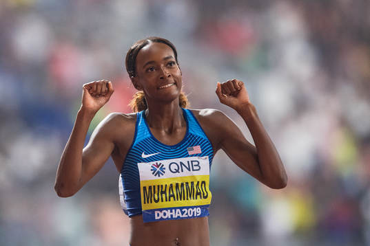 Dalilah Muhammad of USA celebrates winning the women’s