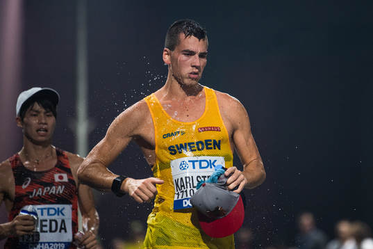 Water running off Perseus Karlström of Sweden as he