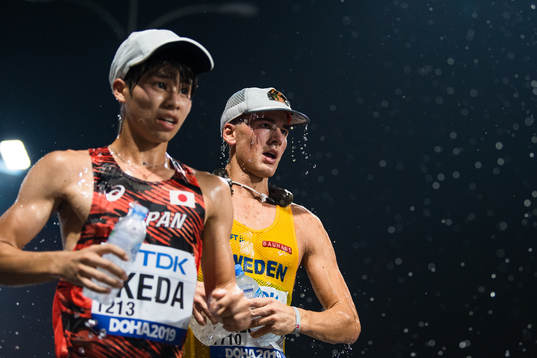 Water running off Perseus Karlström of Sweden as he