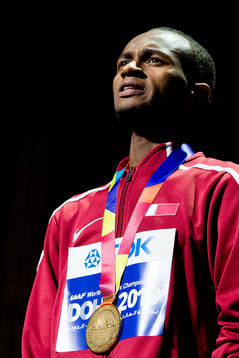 Mutaz Essa Barshim of Qatar with his gold medal at the