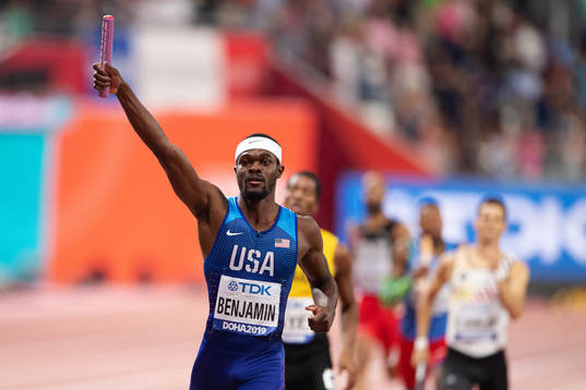 Rai Benjamin of USA celebrates when crossing the finish