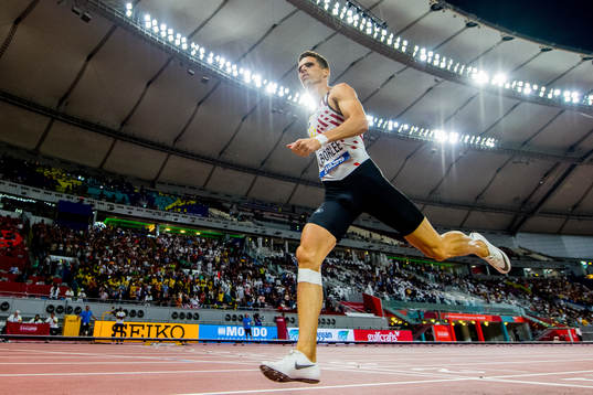 Kévin Borlée of Belgium crosses the finish line to come