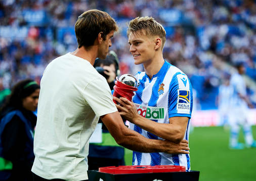 Xavi Prieto gives Martin Odegaard of Real Sociedad the