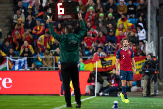 Håvard Nordtveit of Norway leave the field because of an