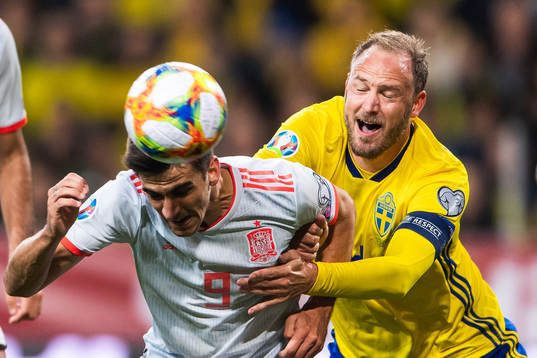 Gerard Moreno of Spain and Andreas Granqvist of Sweden