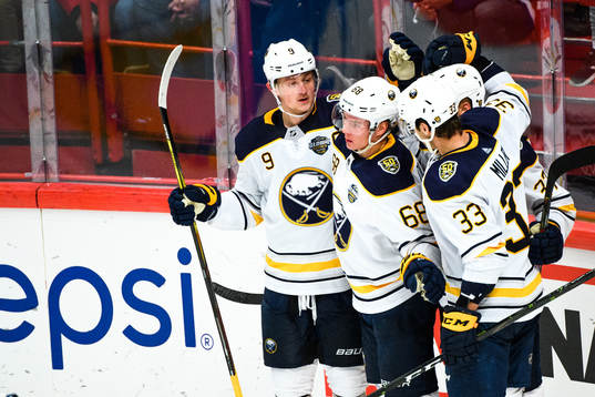 Jack Eichel, Victor Olofsson and Colin Miller of Buffalo