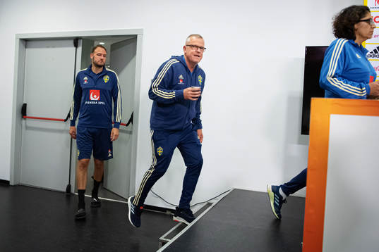 Andreas Granqvist and head coach Janne Andersson of the