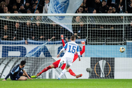 Viktor Tsyganov of Dynamo Kiev scores 1-2 behind goalkeeper
