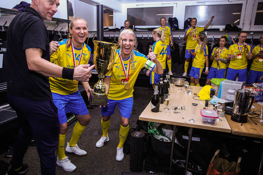 Moa Tschöp and Anna Wijk of Sweden celebrate in the locker