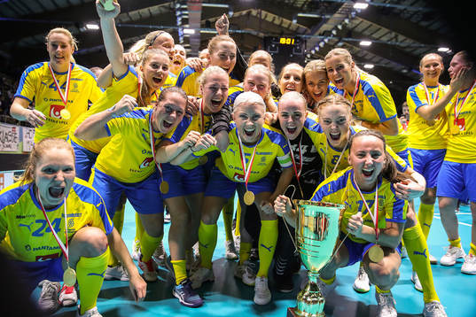 Players of Sweden celebrate with the trophy