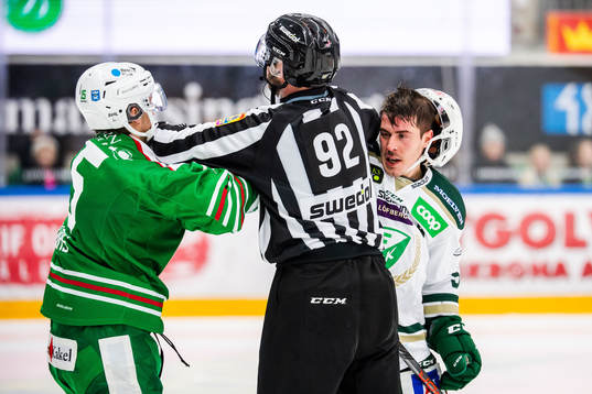 Rögles Simon Ryfors och Färjestads Sebastian Erixon i