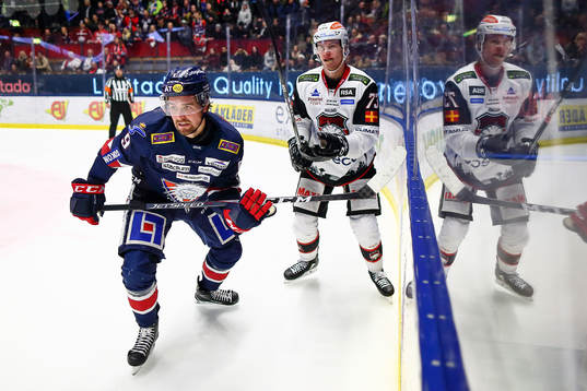 Linköpings Mikael Frycklund och Malmö Redhawks Adam Ollas
