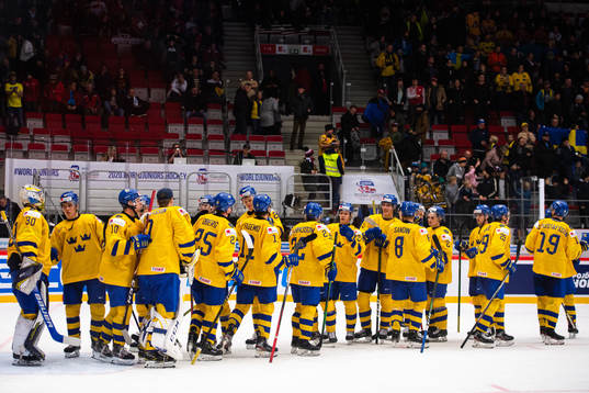 Players of Sweden celebrate