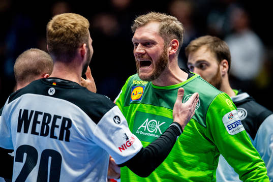Philipp Weber and goalkeeper Johannes Bitter of Germany