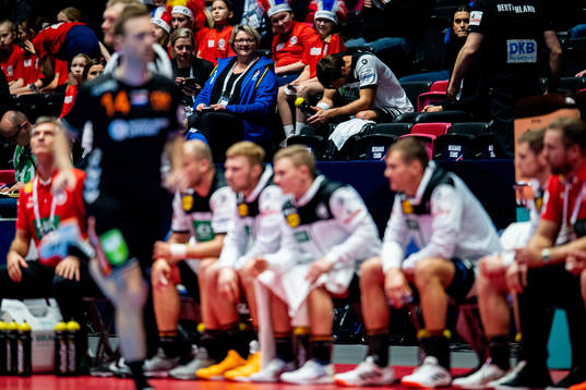 Uwe Gensheimer of Germany looks dejected sitting in the