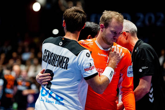 Uwe Gensheimer of Germany with goalkeeper Bart Ravensbergen