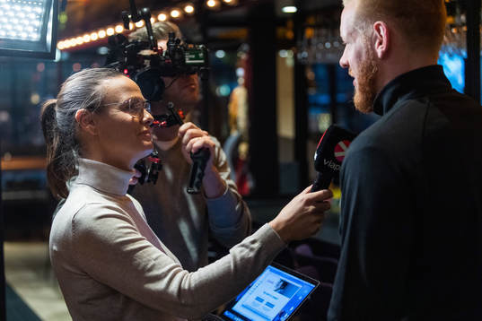 Suzanne Sjögren of Swedish broadcaster Viasat interviews