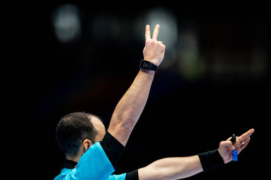 The referee gives a player a two-minute suspension