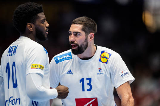 Dika Mem and Nikola Karabatic of France