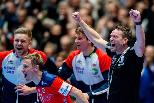 Christian Berge, head coach of Norway, celebrates at the