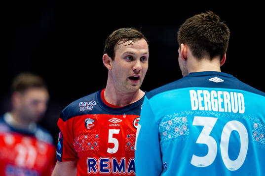 Sander Sagosen and goalkeeper Torbjørn Bergerud of Norway