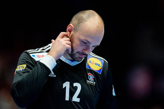 Goalkeeper Vincent Gerard of France looks dejected