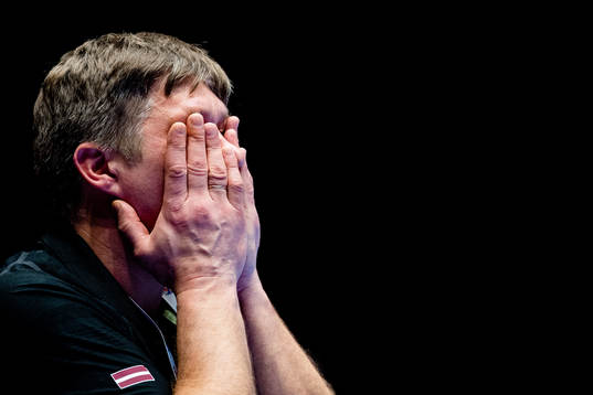 Armands Uscins, head coach of Latvia, looks dejected
