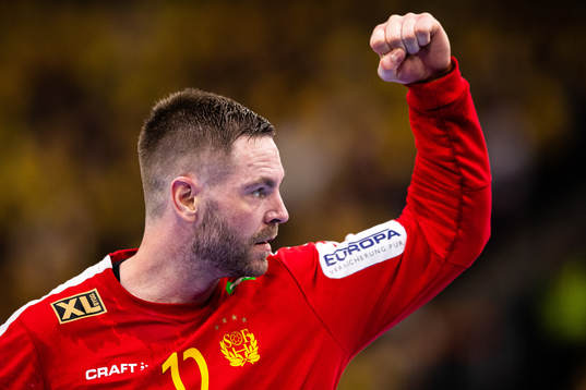 Goalkeeper Andreas Palicka of Sweden celebrates