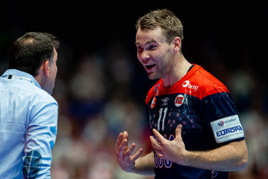 Petter Øverby of Norway argues with Paulo Fidalgo,